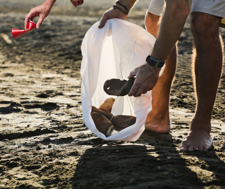 people picking up trash in the city