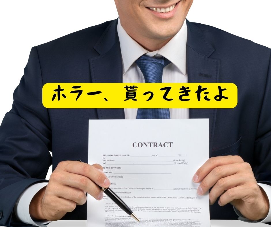 A man showing off a contract