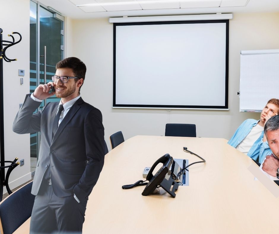 three men having a meeting